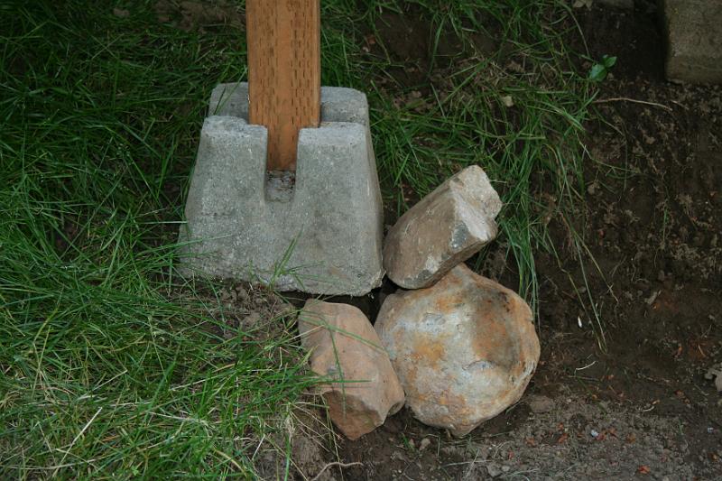 IMG_1746.JPG - Rocks placed inder block used to hold up deck (left side)